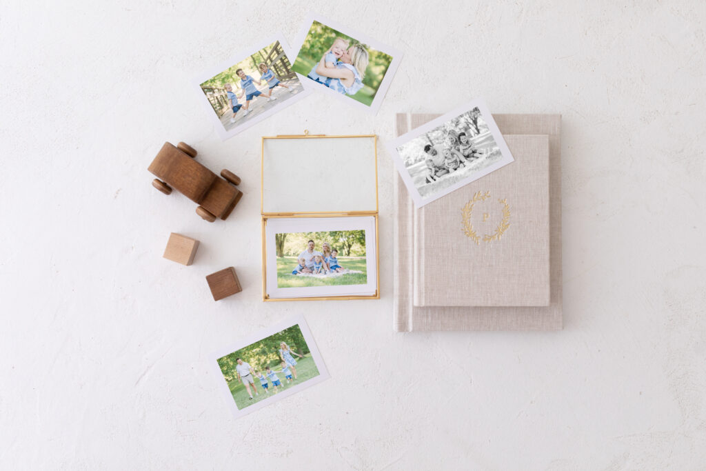 Image of a set of photo products such as an album, glass display box and various prints.